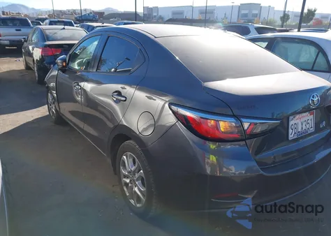 2017 Toyota Yaris Ia из США, поврежденный, VIN 3MYDLBYV6HY168376